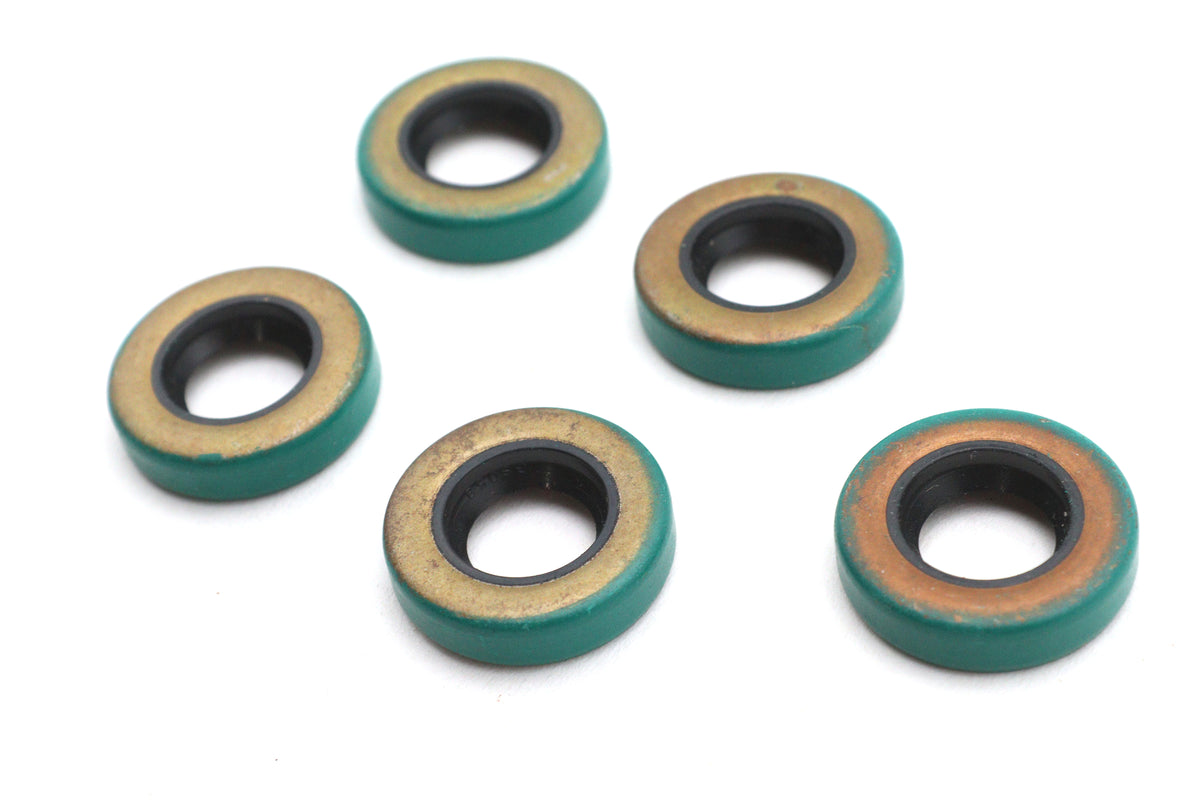 Cometic C9525 transmission shifter shaft oil seals, black rubber seals close-up