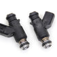 Daytona Twin Tech 20039 replacement fuel injector set, two injectors displayed for motorcycle fuel and air system repair