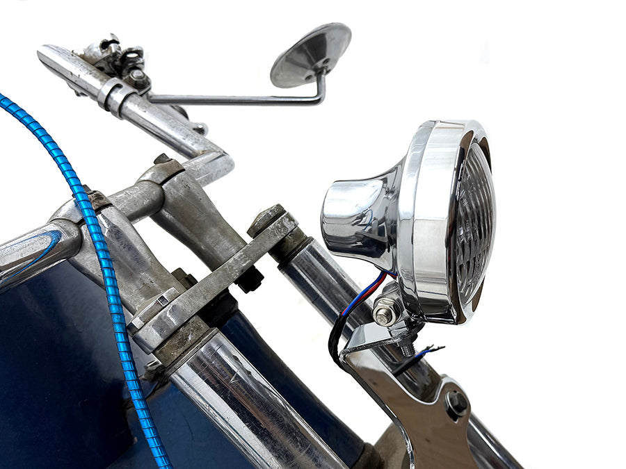 V-Twin 4-inch retro headlamp in polished finish for motorcycle lighting
